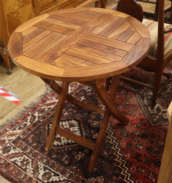 A teak folding garden table Diameter 70cm